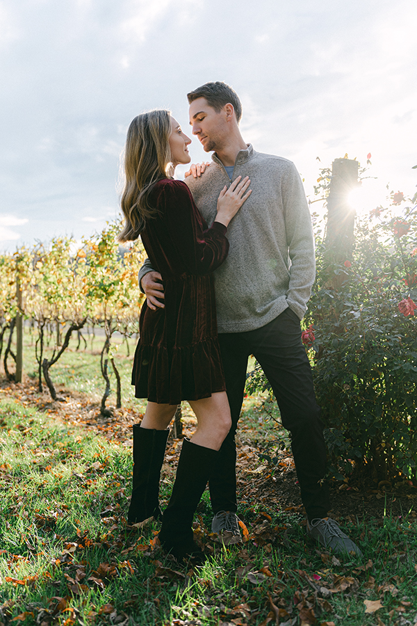 engaged couple in a vineyard