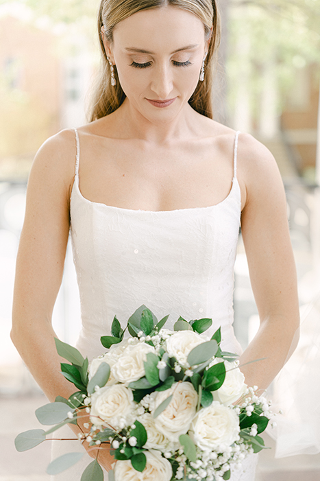 view of bride with her bouquet