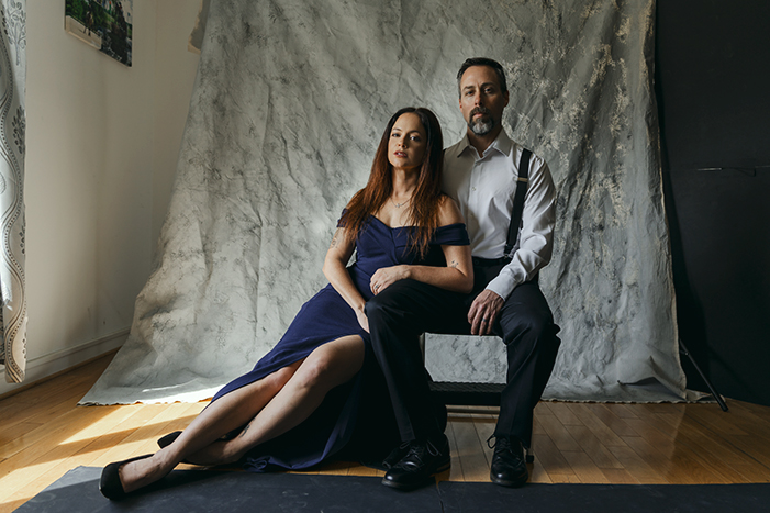 the set up of an mobile photography studio for dramatic couple portraits